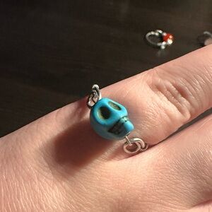 Turquoise skull silver fidget ring